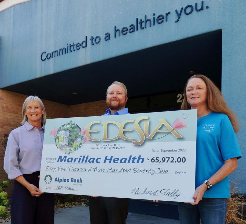 photo of large size check presented to marillachealth for edesia 2023 fundraising